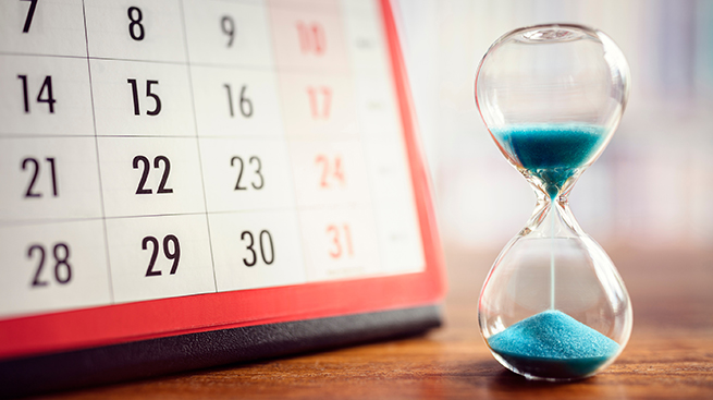 Hour glass and calendar concept for time