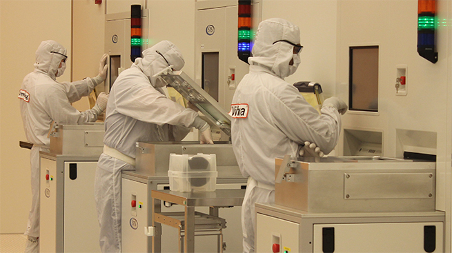 3 researchers in the lurie nanofabrication facility