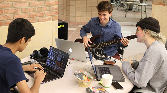 Students working on music project