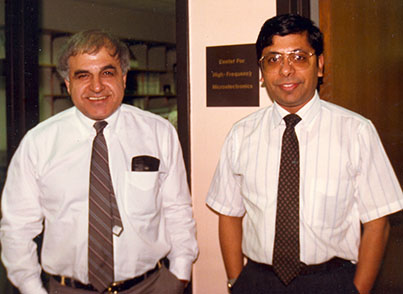 George Haddad and Pallab Bhattacharya in front of the CHFM sign