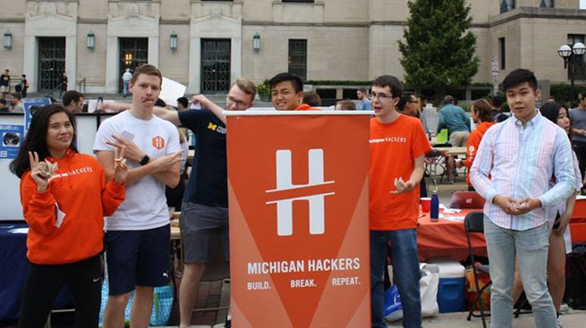 Michigan Hackers team in front of Rackham